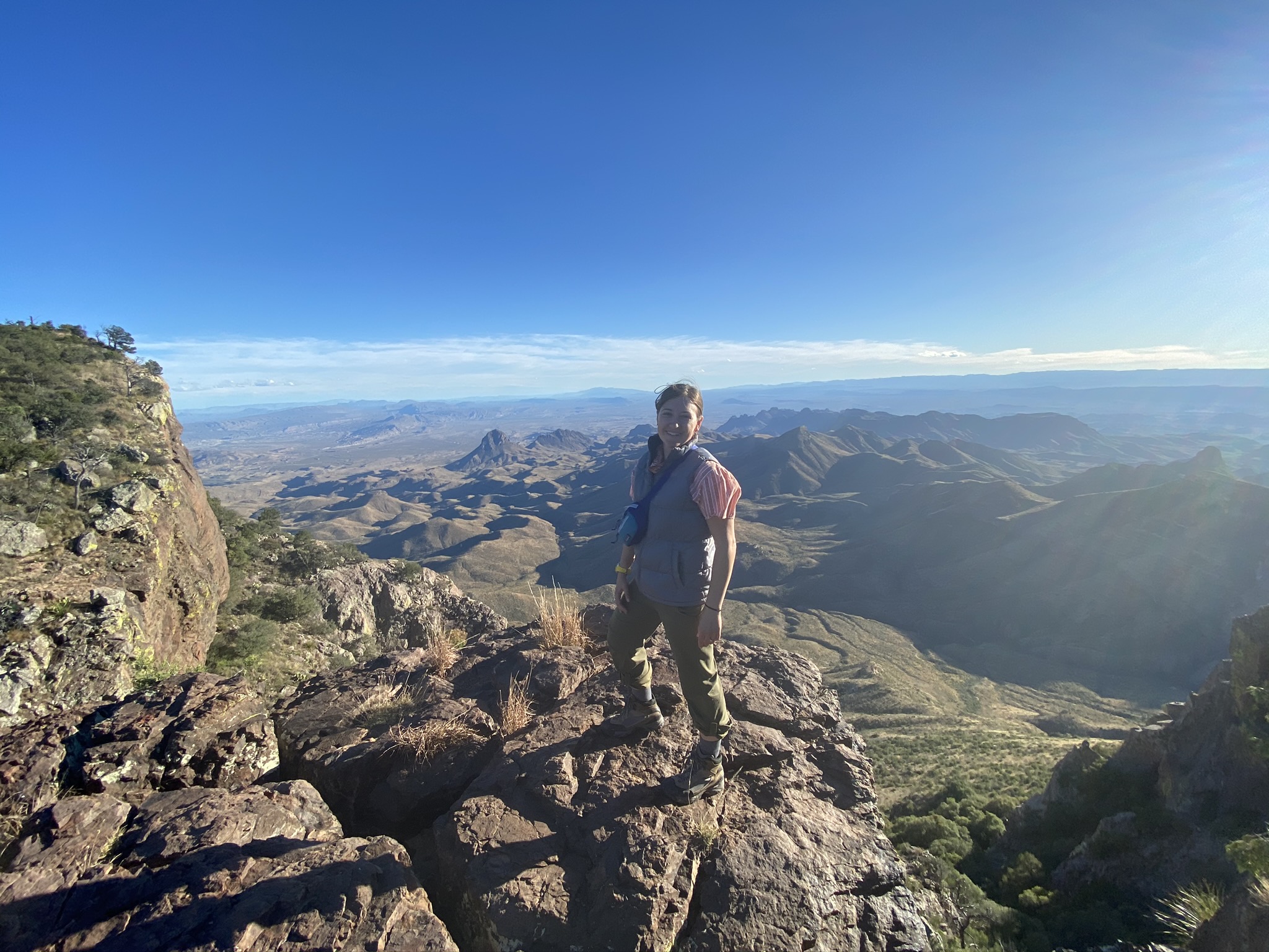 Amber stands on the edge of a cliff at Big Bend National Park