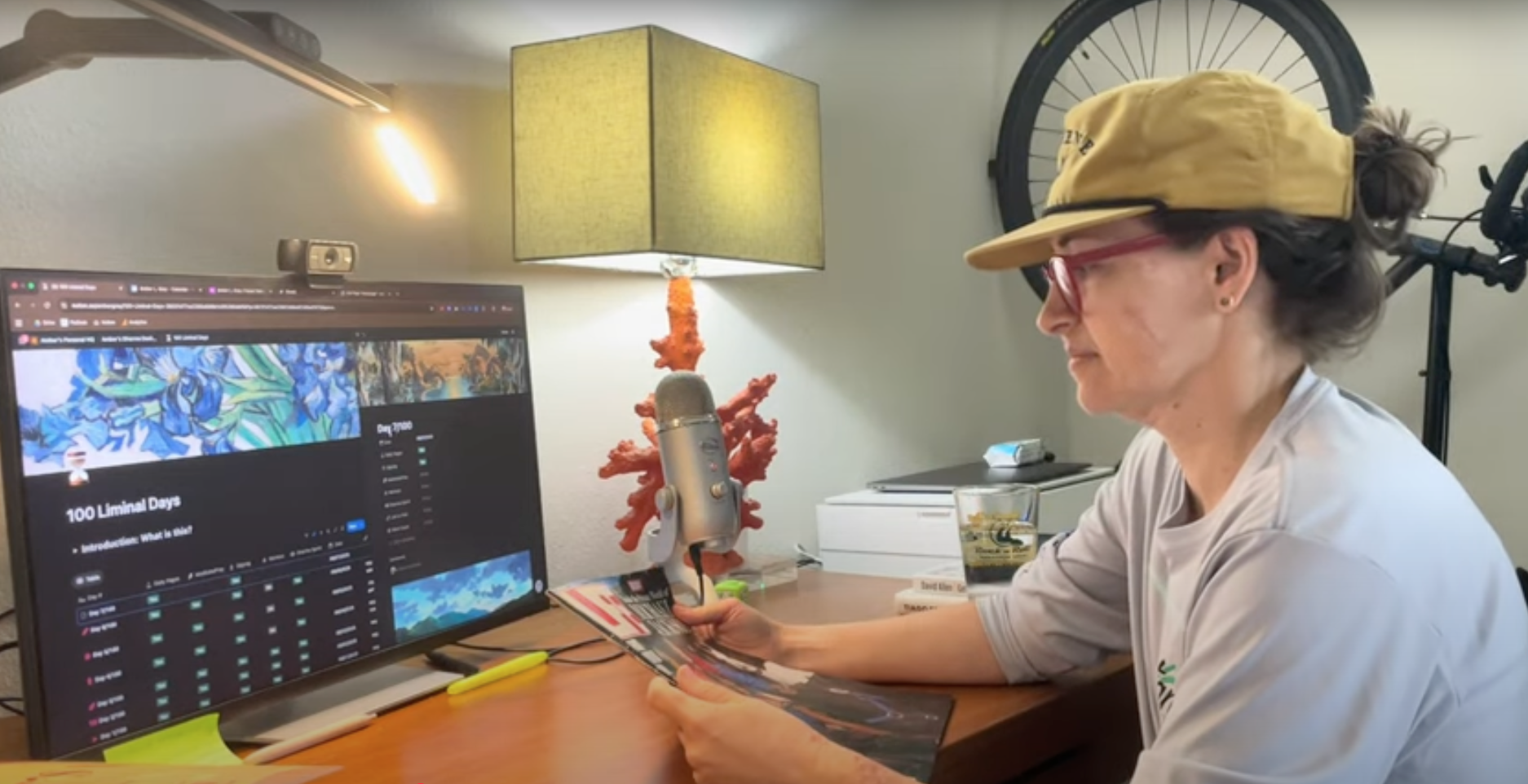 Amber is looking at a 1993 issue of LIFE magazine. She's sitting at a desk with her computer screen in front of her.
