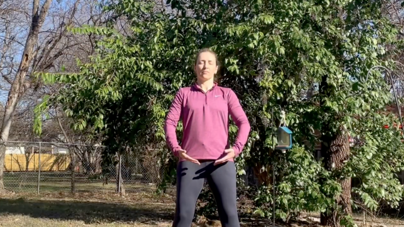Amber holding the Lower Embracing the Tree posture