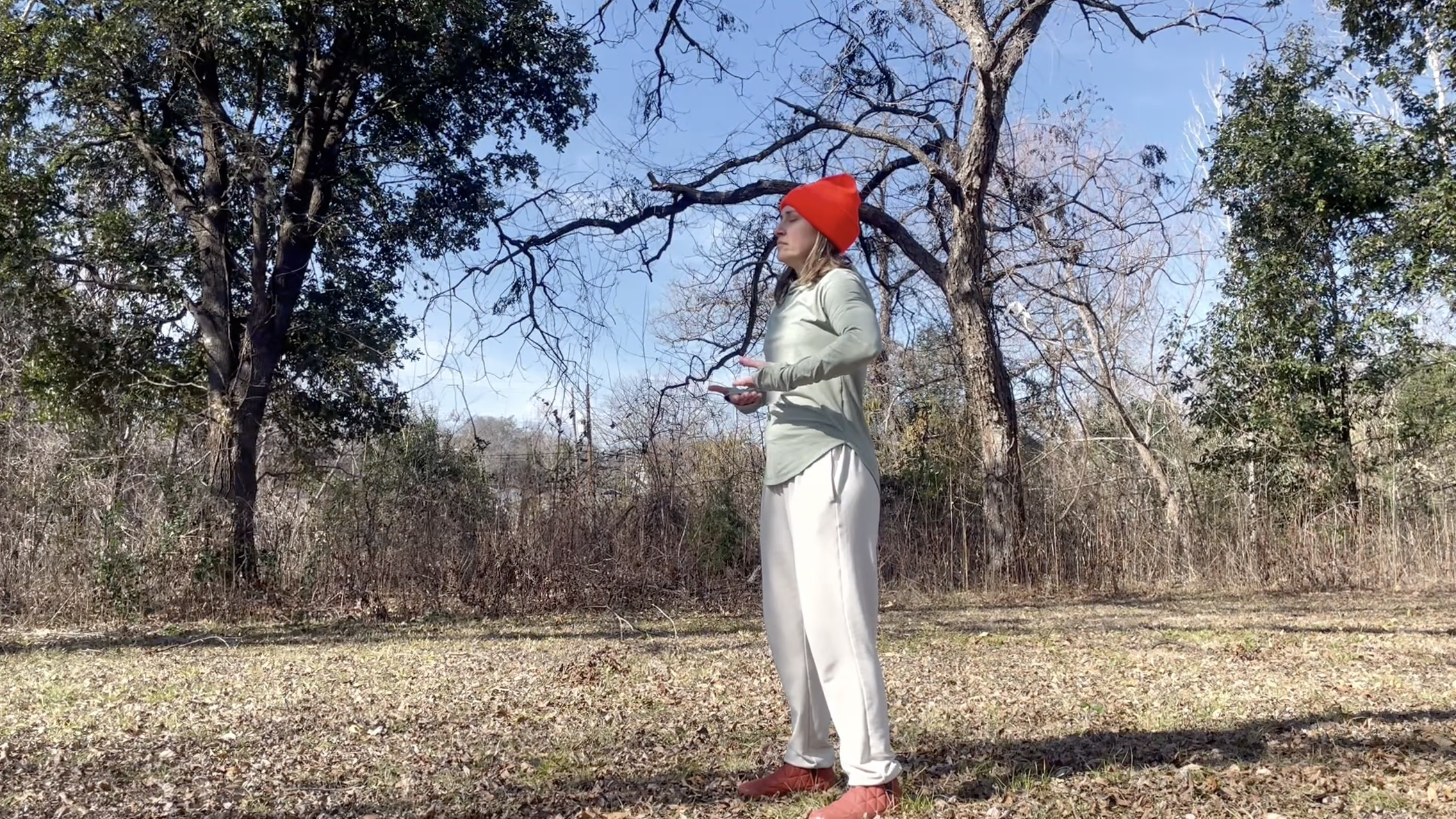 Amber practicing qigong outdoors